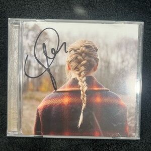 signed taylor swift evermore cd